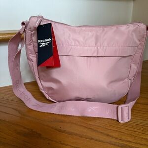Reebok SOPHIE Crossbody Adjustable Strap Pink Bag Size: H9.75” X W12.5" X D4.5”